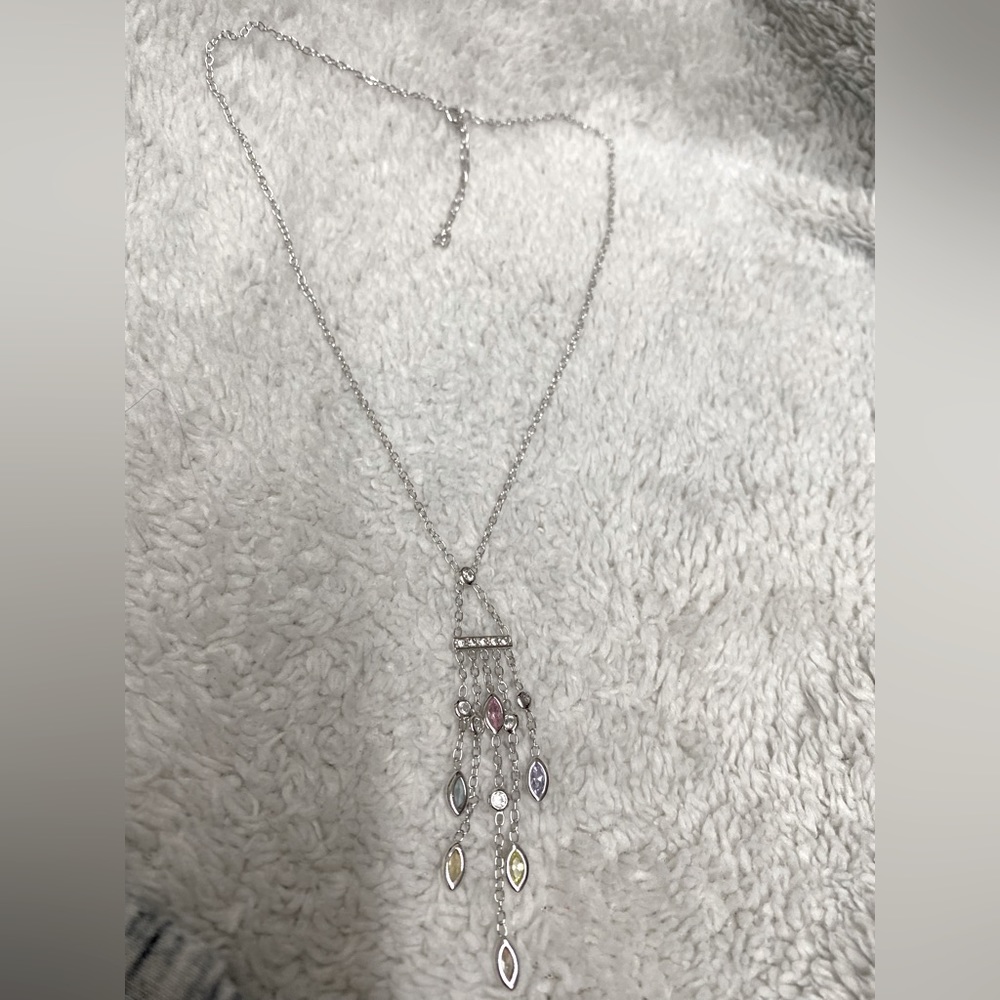 Delicate silver necklace with charms